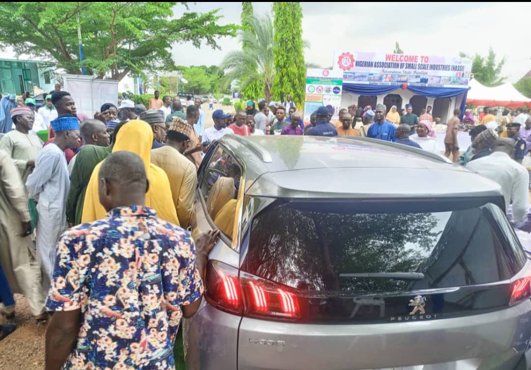 At the Nasarawa Trade Fair, a sea of onlookers encircled the Dangote Peugeot 5008.